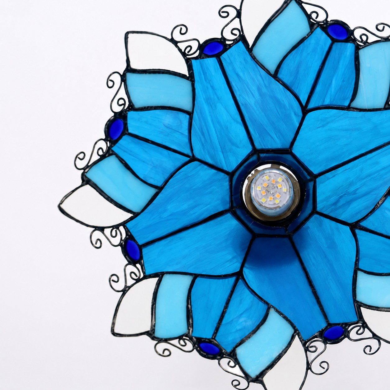 Applique murale en vitrail bleu avec bras courbé (détail du matériau)