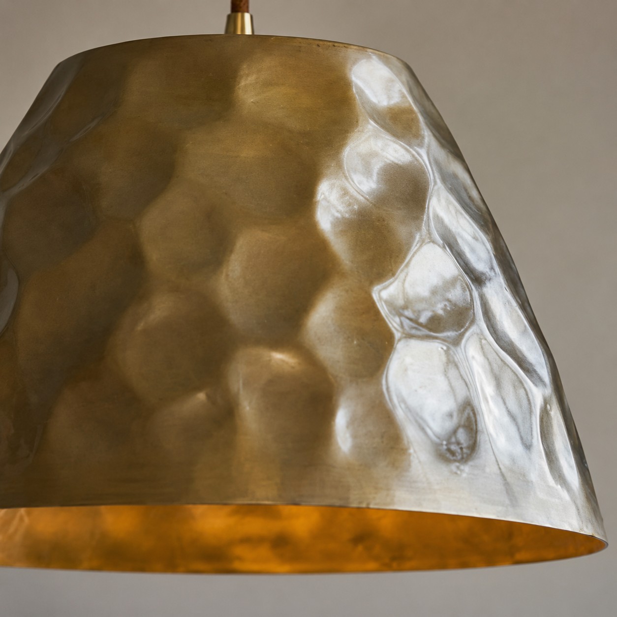 Close-up of hammered brass shade texture