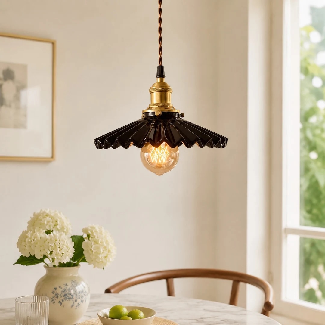 Pleated ceramic pendant light near a bright dining window