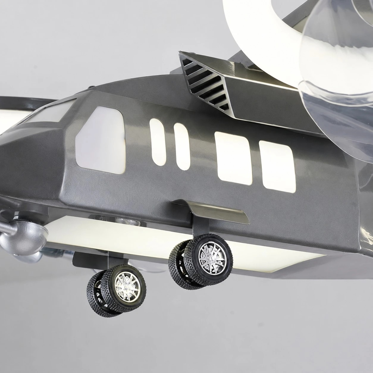 Aircraft body shape with visible canopy and wheel details