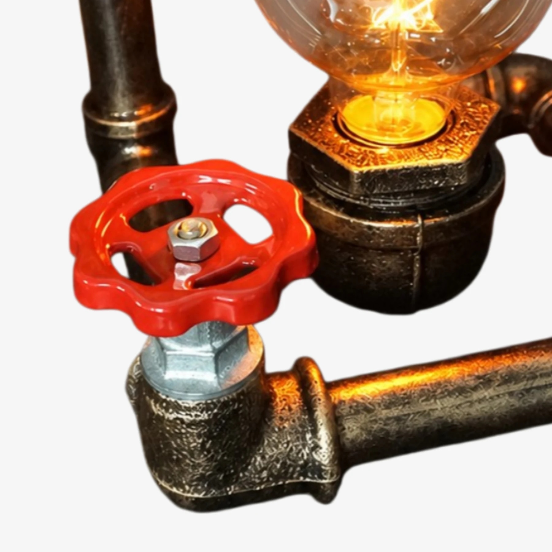 Detalle de la válvula roja y el accesorio de tubería