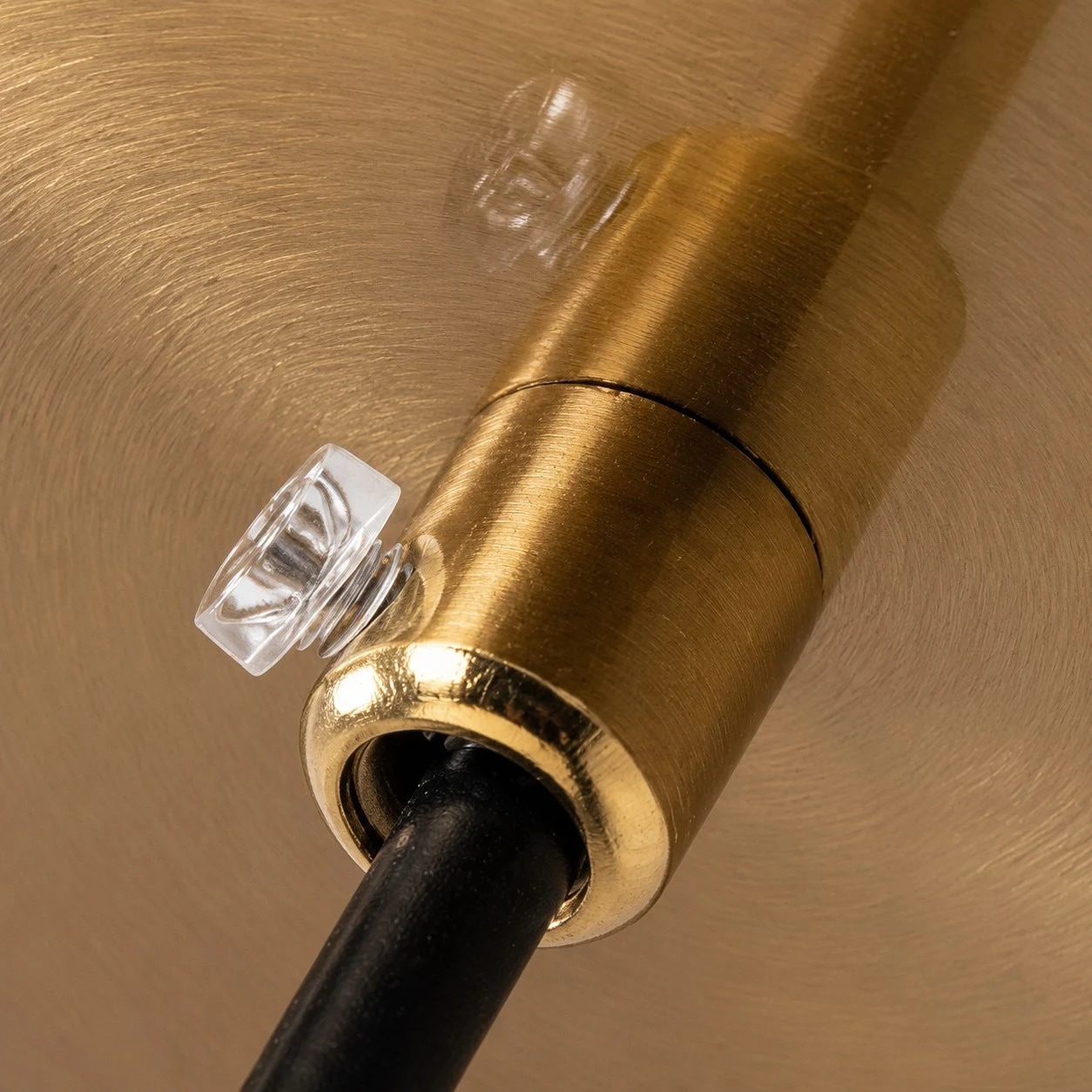 Pendant hanging cord and brass canopy detail