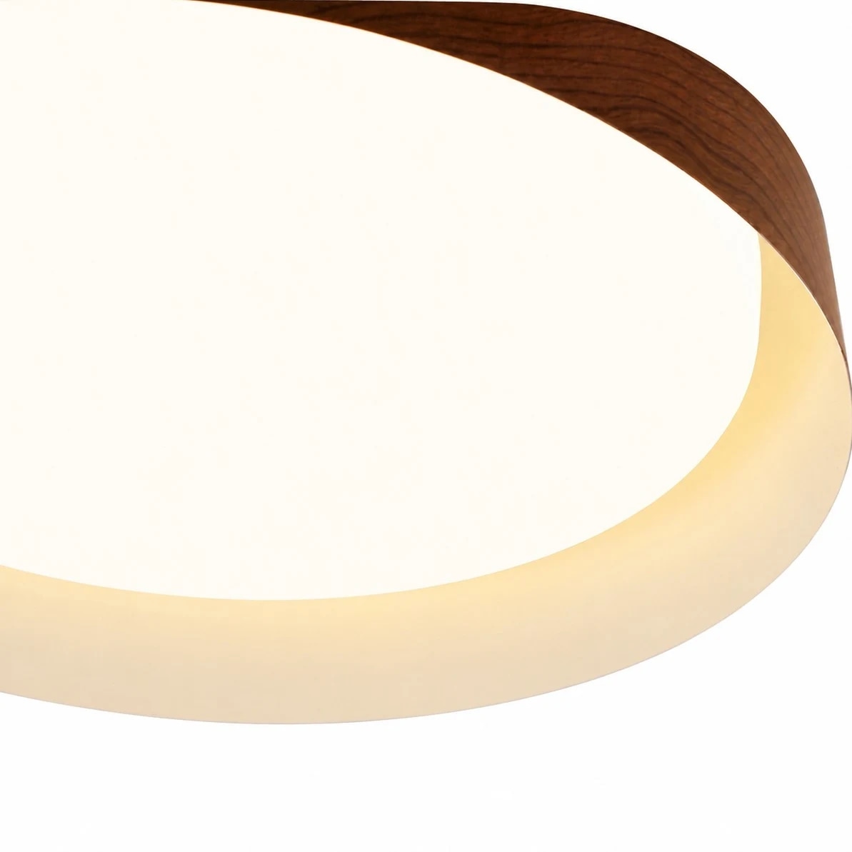 Close view of the wood-grain outer shade and diffuser edge