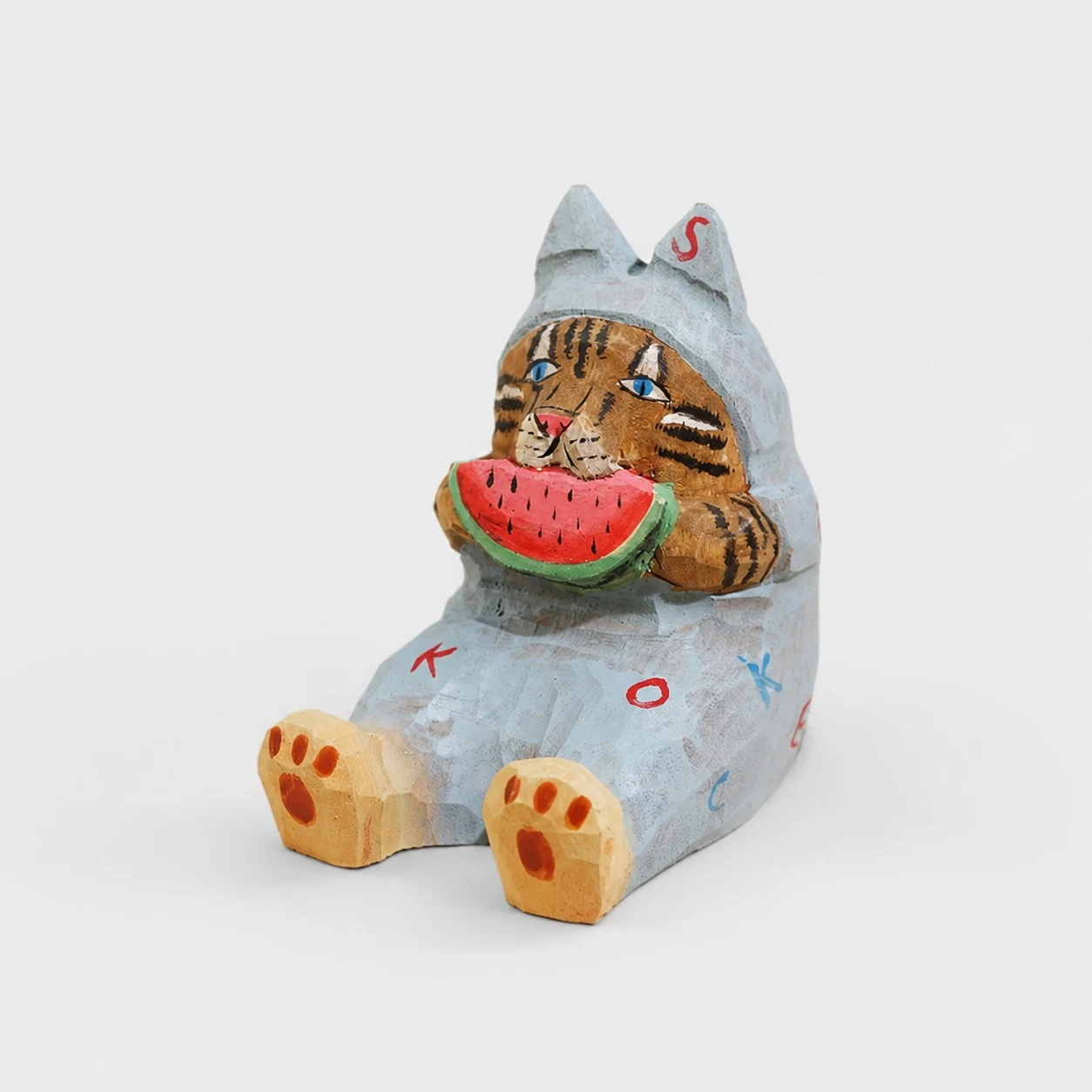 Supporto per telefono in legno intagliato a mano a forma di gatto melone.