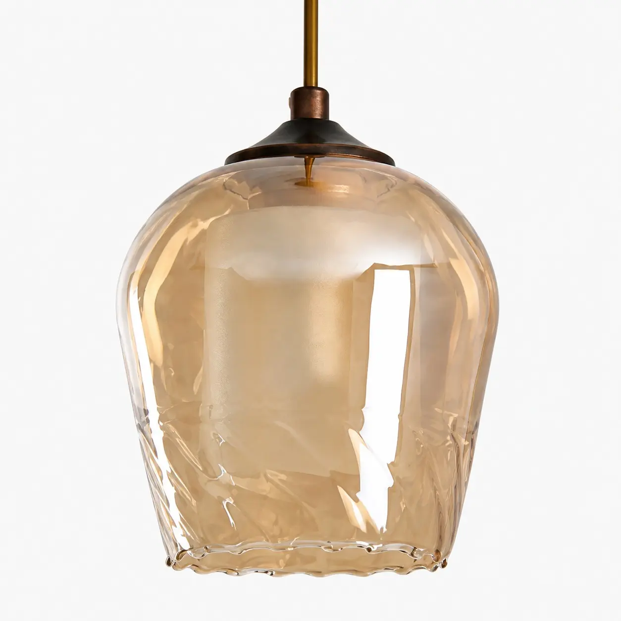 Närbild av den bärnstensfärgade glasskärmen
