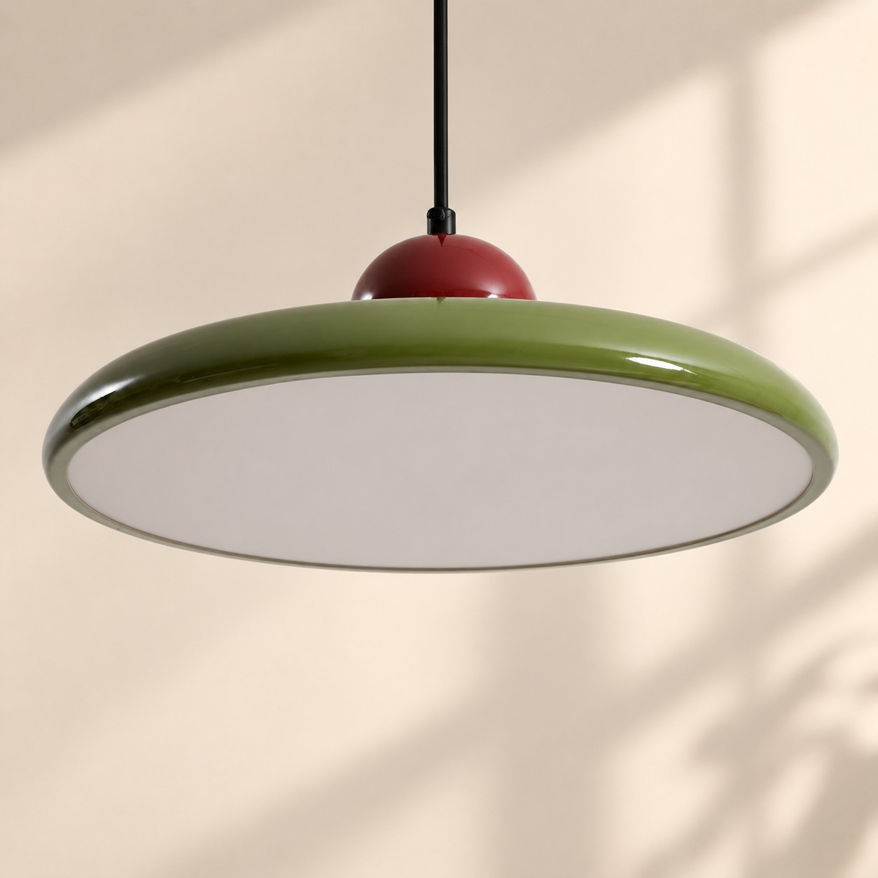 Underside diffuser of Lola acrylic disc pendant