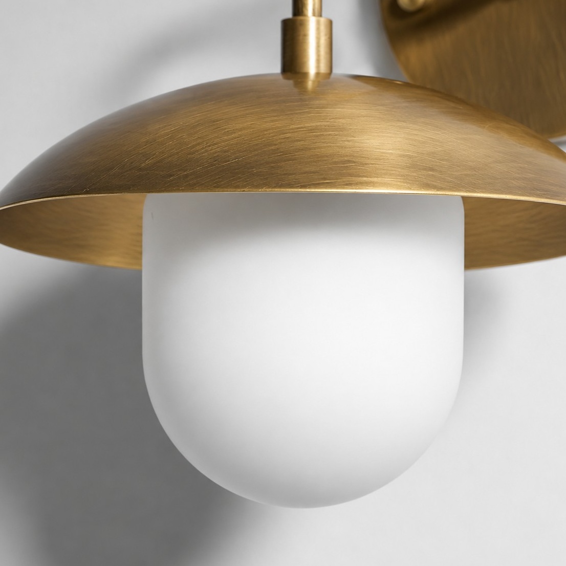 wall lamp profile showing its compact sculptural form
