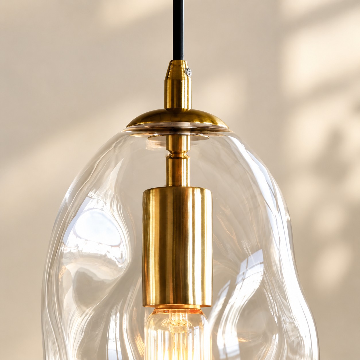 Close-up of organic hand-blown clear glass shade