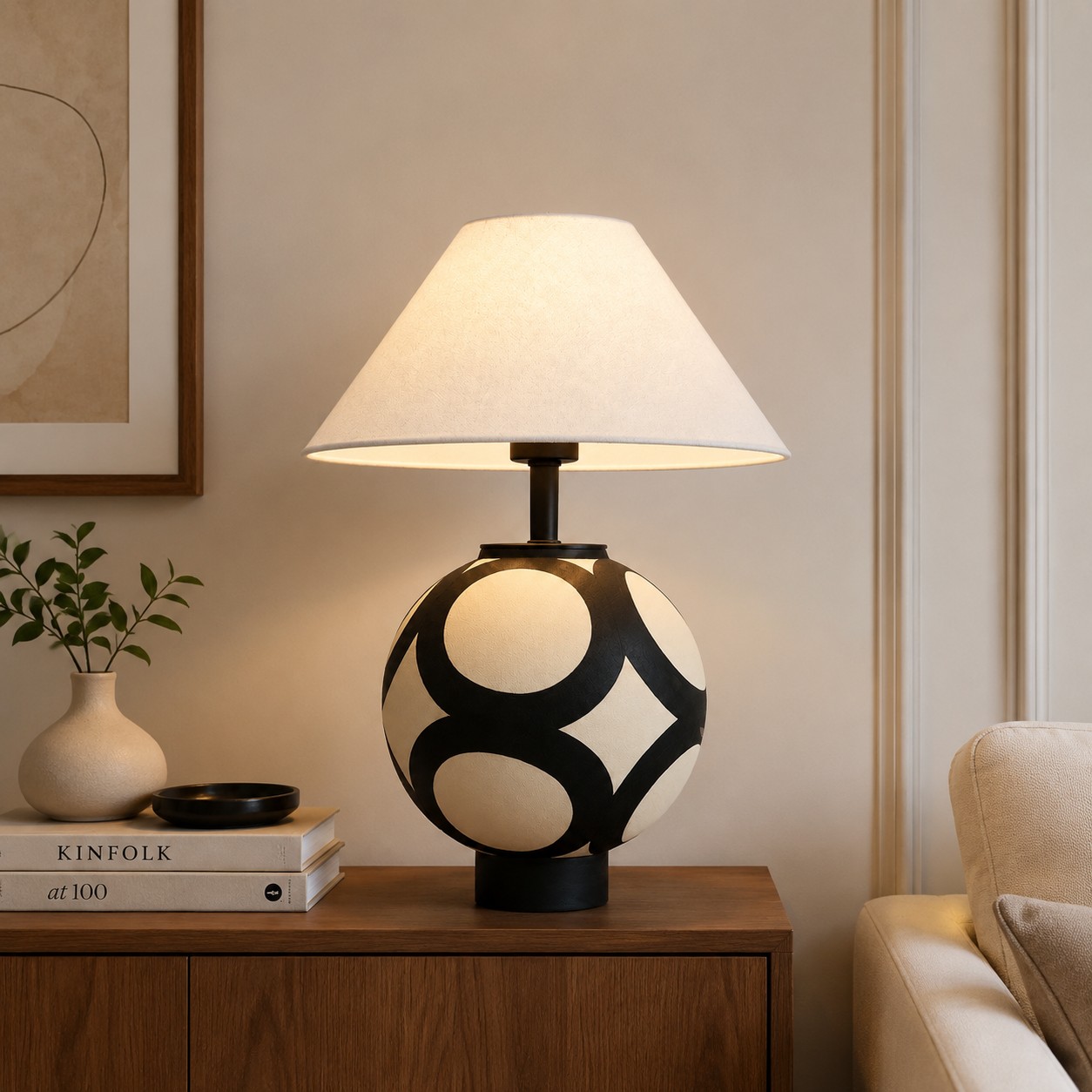 Ceramic globe table lamp on a console table