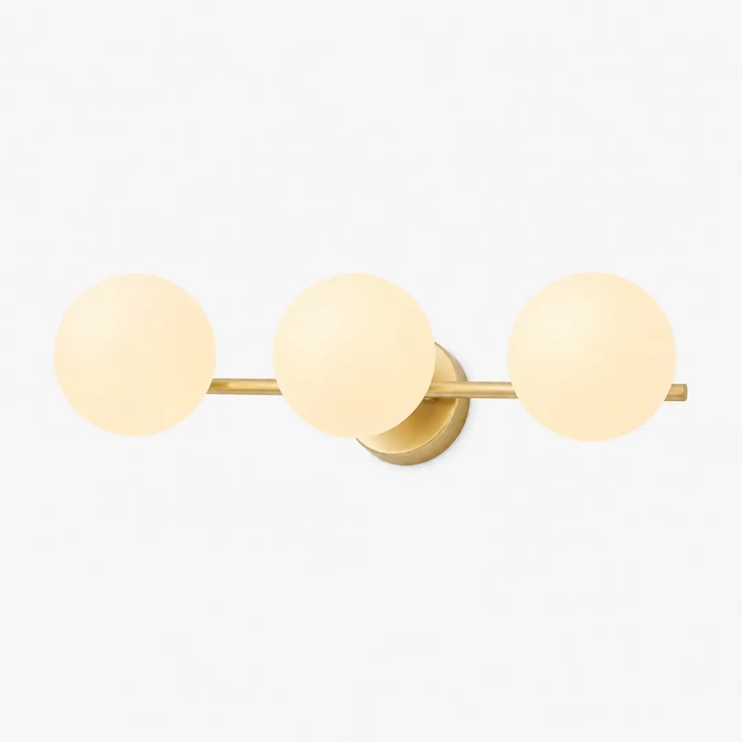 Alternate view of the gold three-light wall lamp