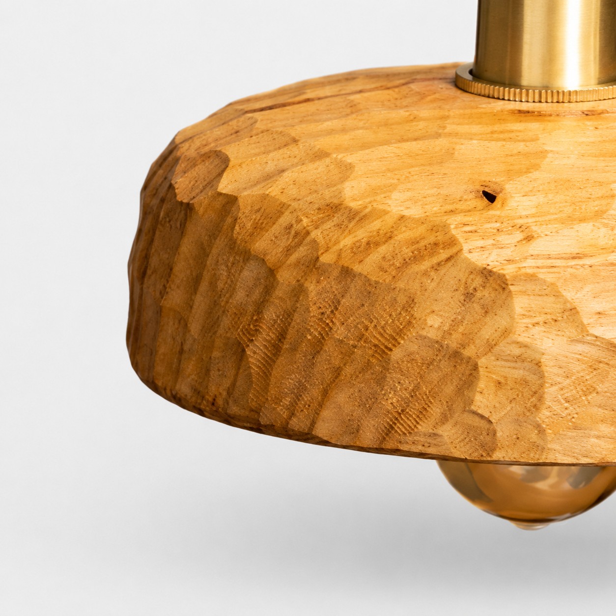 Close view of the hand-carved natural wood shade texture