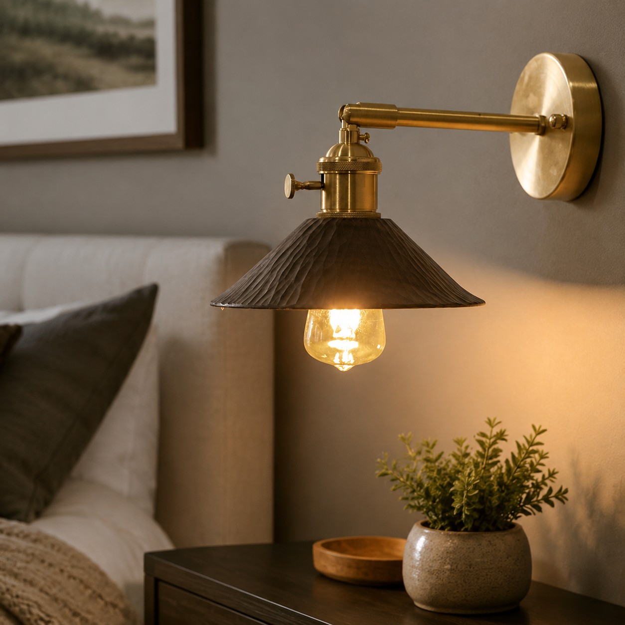 Hand-carved wood and brass wall sconce in a warm home interior