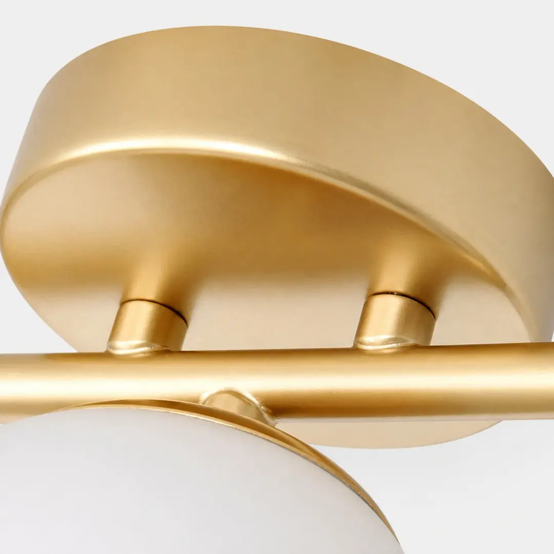 Close-up of the gold arm and mounting joints