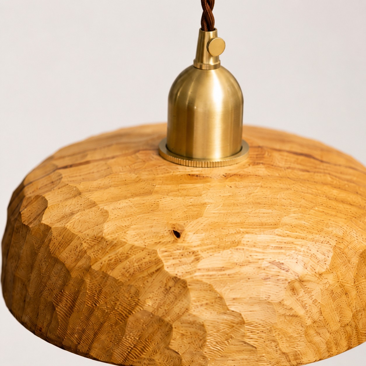 Close view of the natural wood grain and carved edge