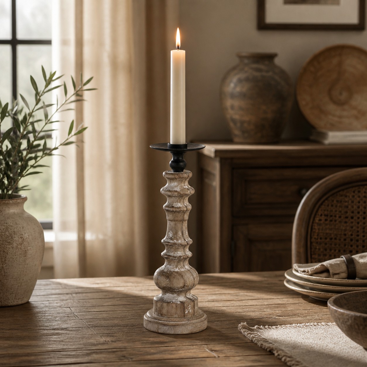 Turned wood candlestick styled on a dining table