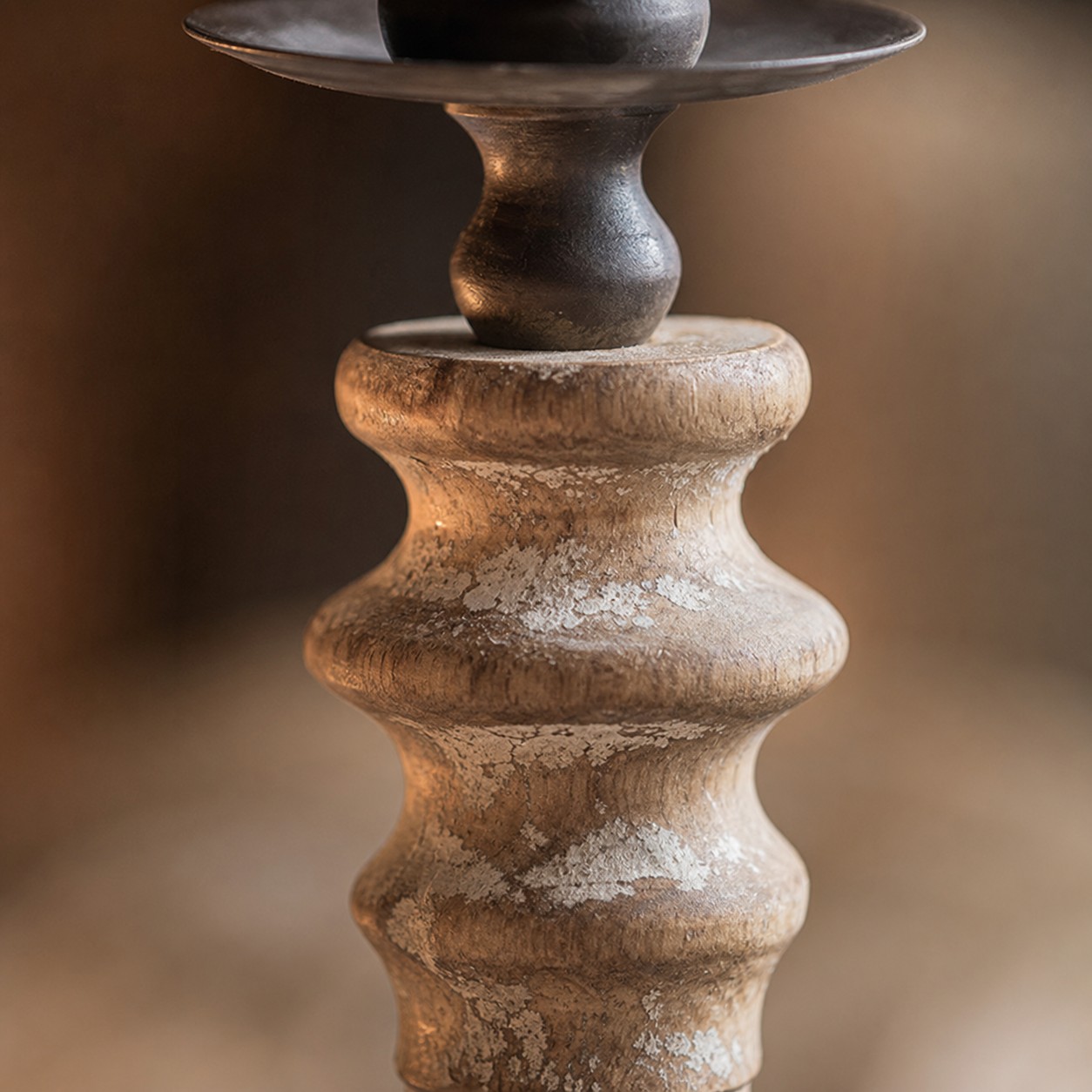 Close view of the turned wood candlestick profile