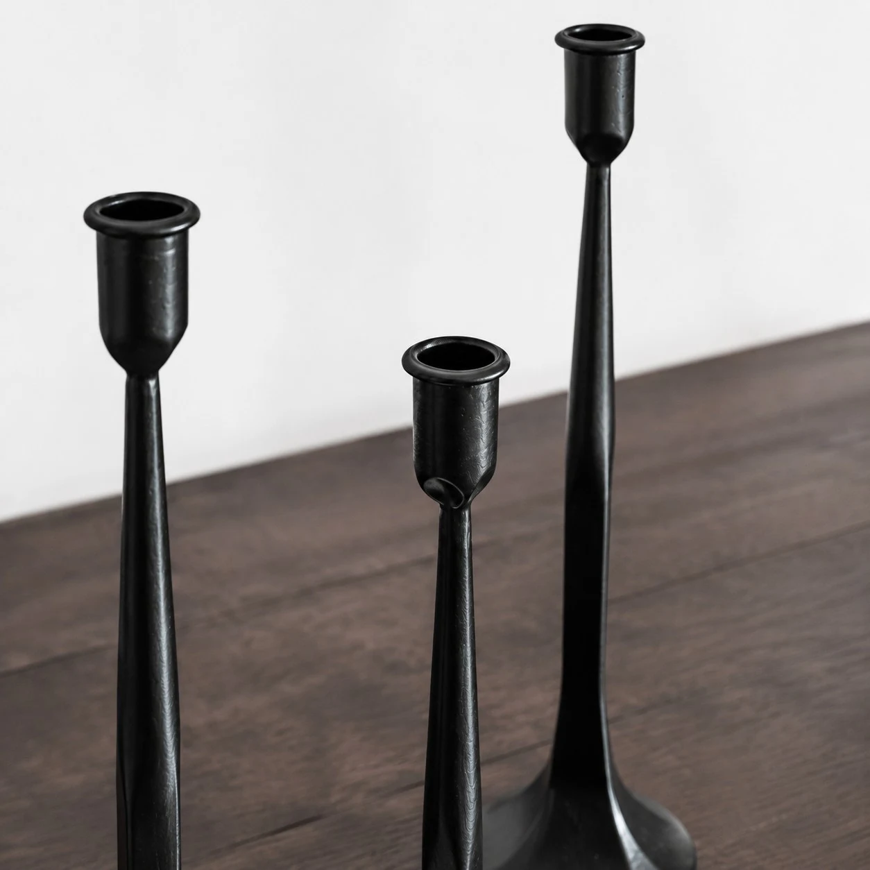 Black iron candle holder cup with hand-finished texture