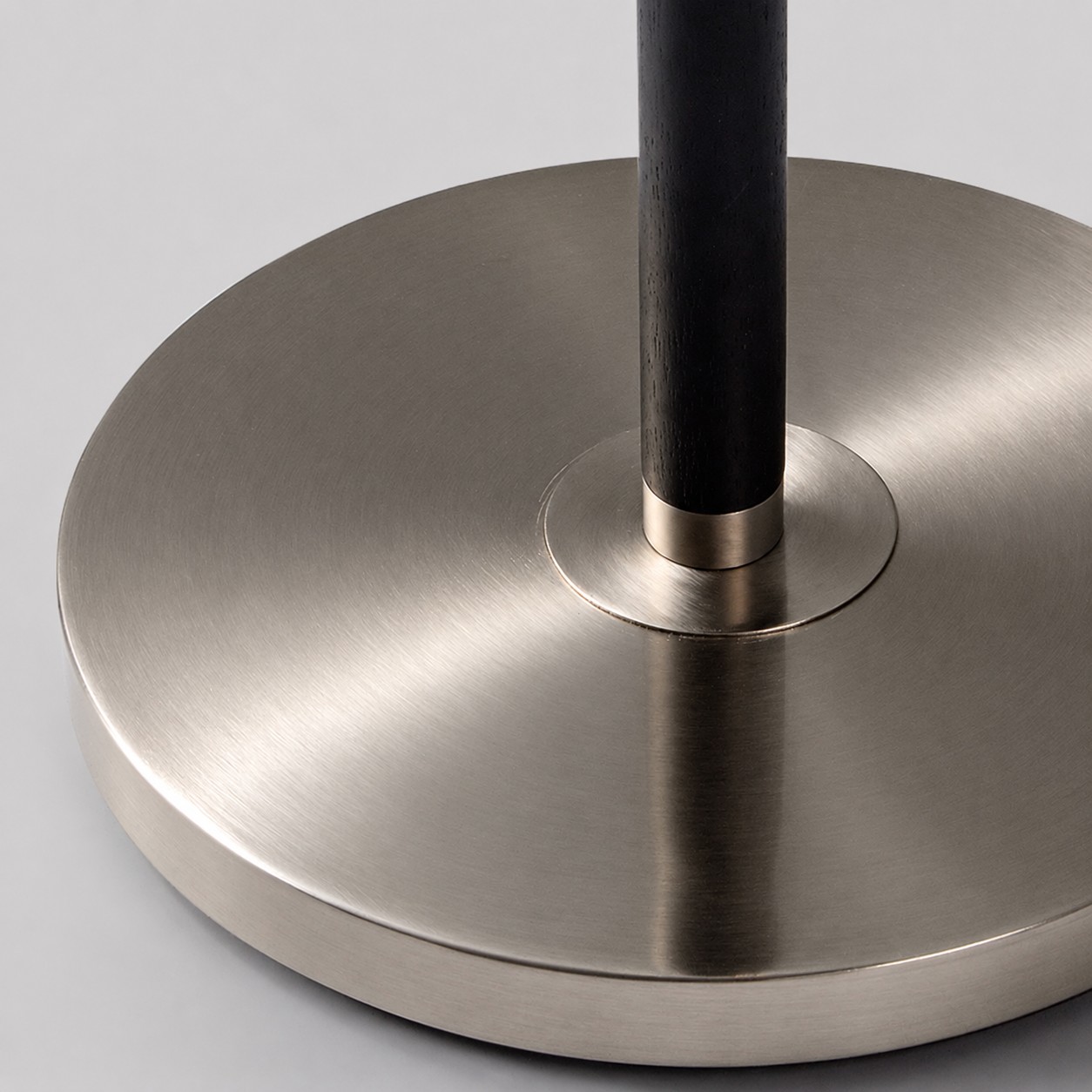 Circular brushed metal floor lamp base