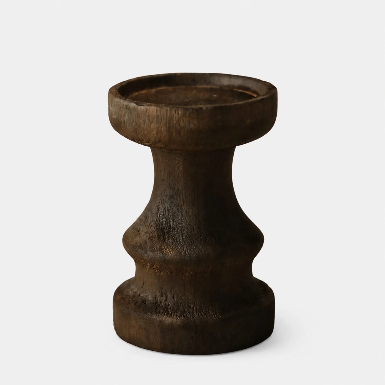 Short dark solid wood candle holder