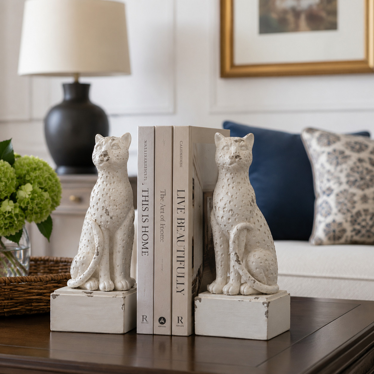 White leopard bookends styled with books on a tabletop