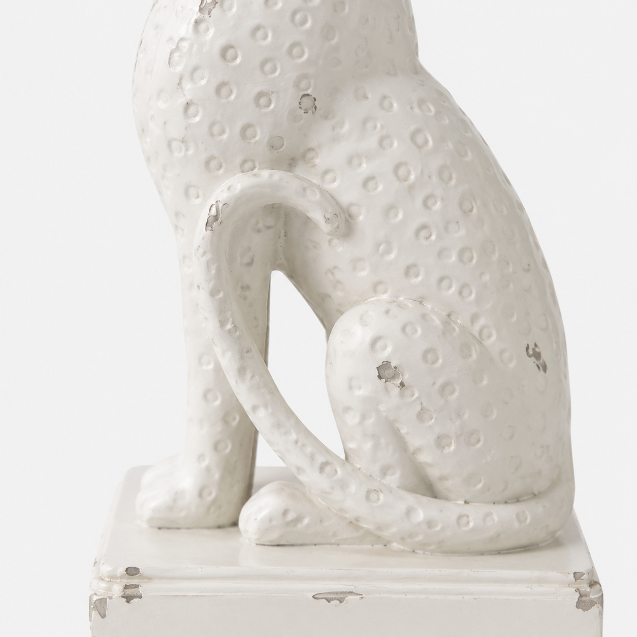 Close-up of raised resin texture on the leopard bookend