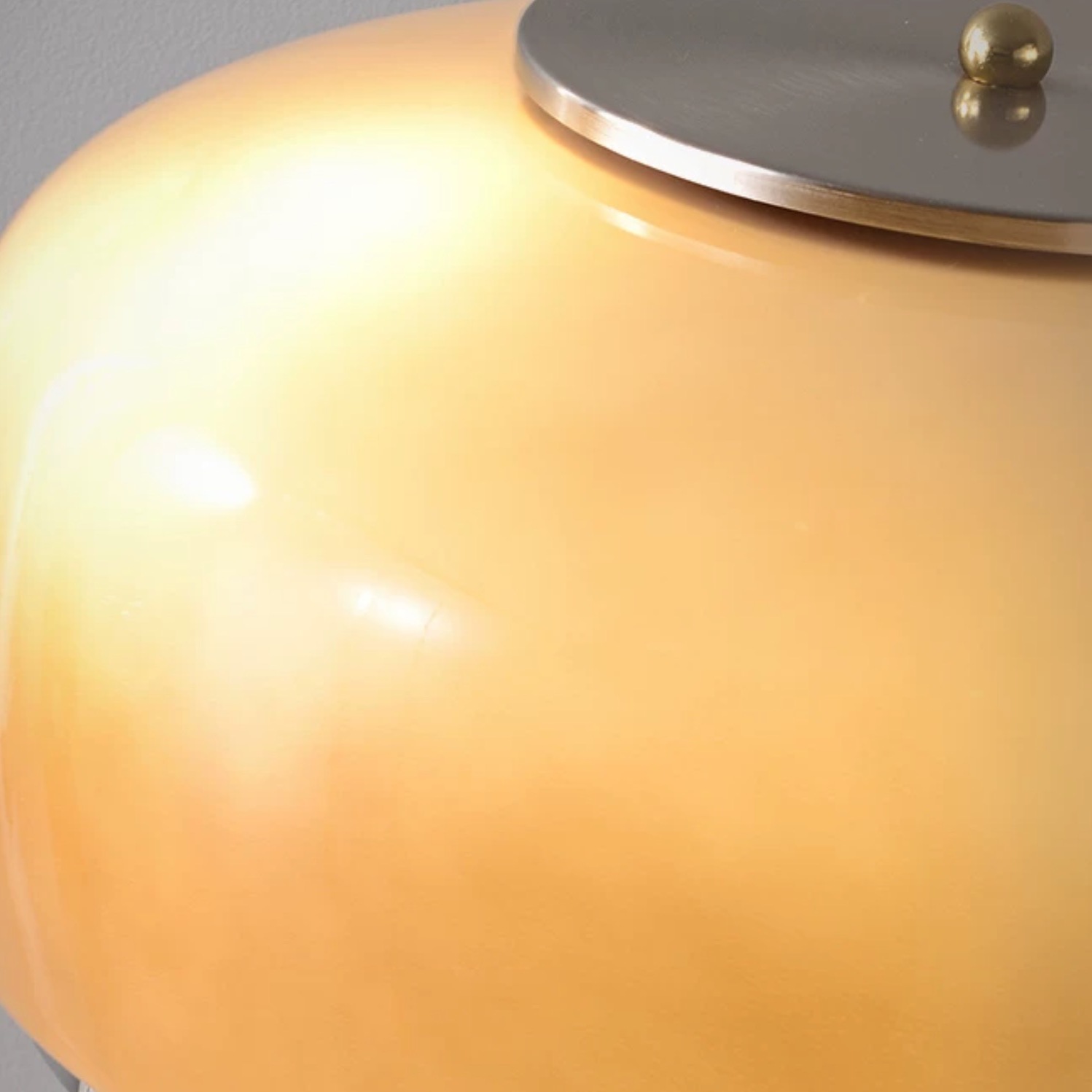 Illuminated smoky taupe glass lamp shade