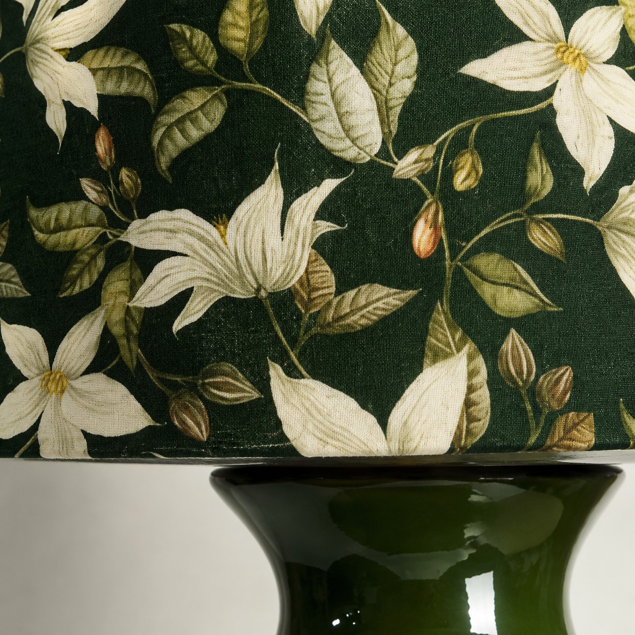 Detailed view of vintage green floral table lamp
