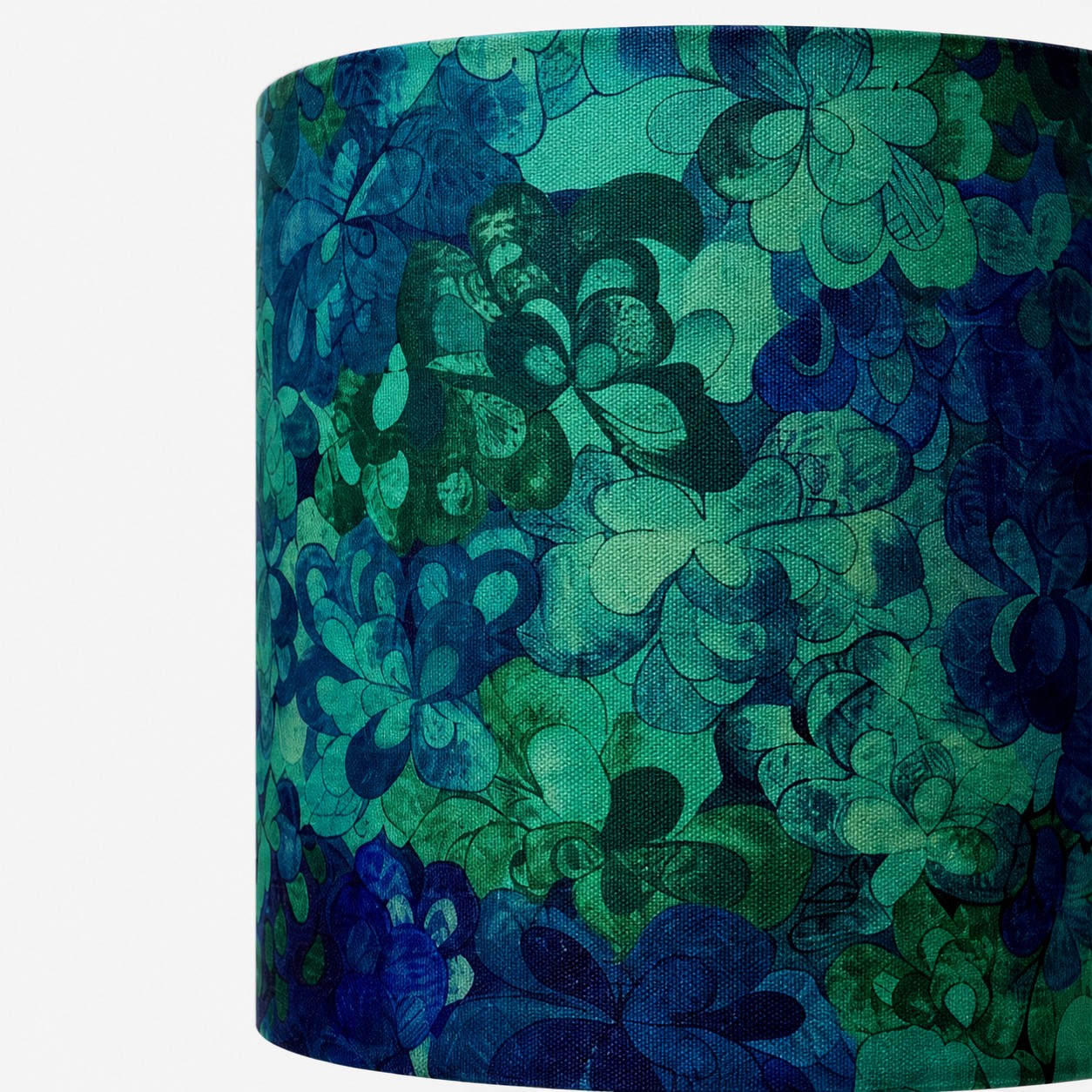 Stampa botanica color verde acqua e dettagli in tessuto intrecciato