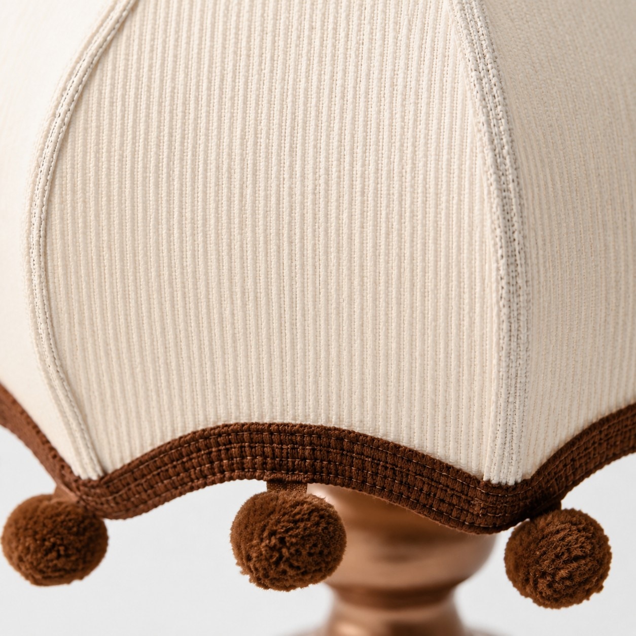 Pleated fabric and pom-pom trim