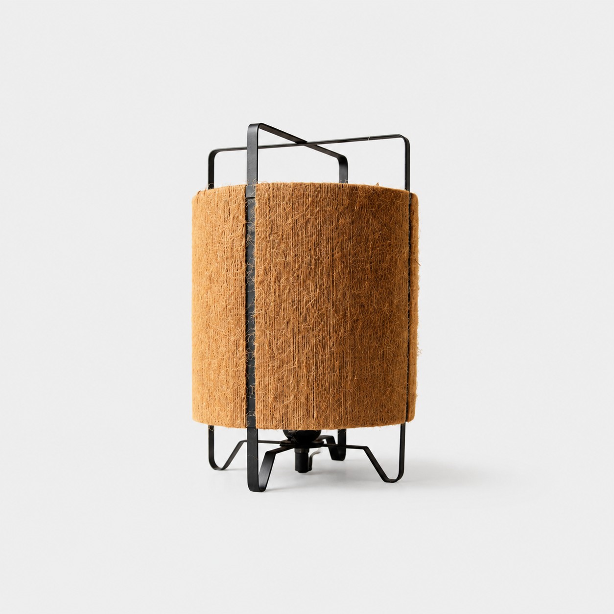 Coffee fabric woven LED table lamp on gray background