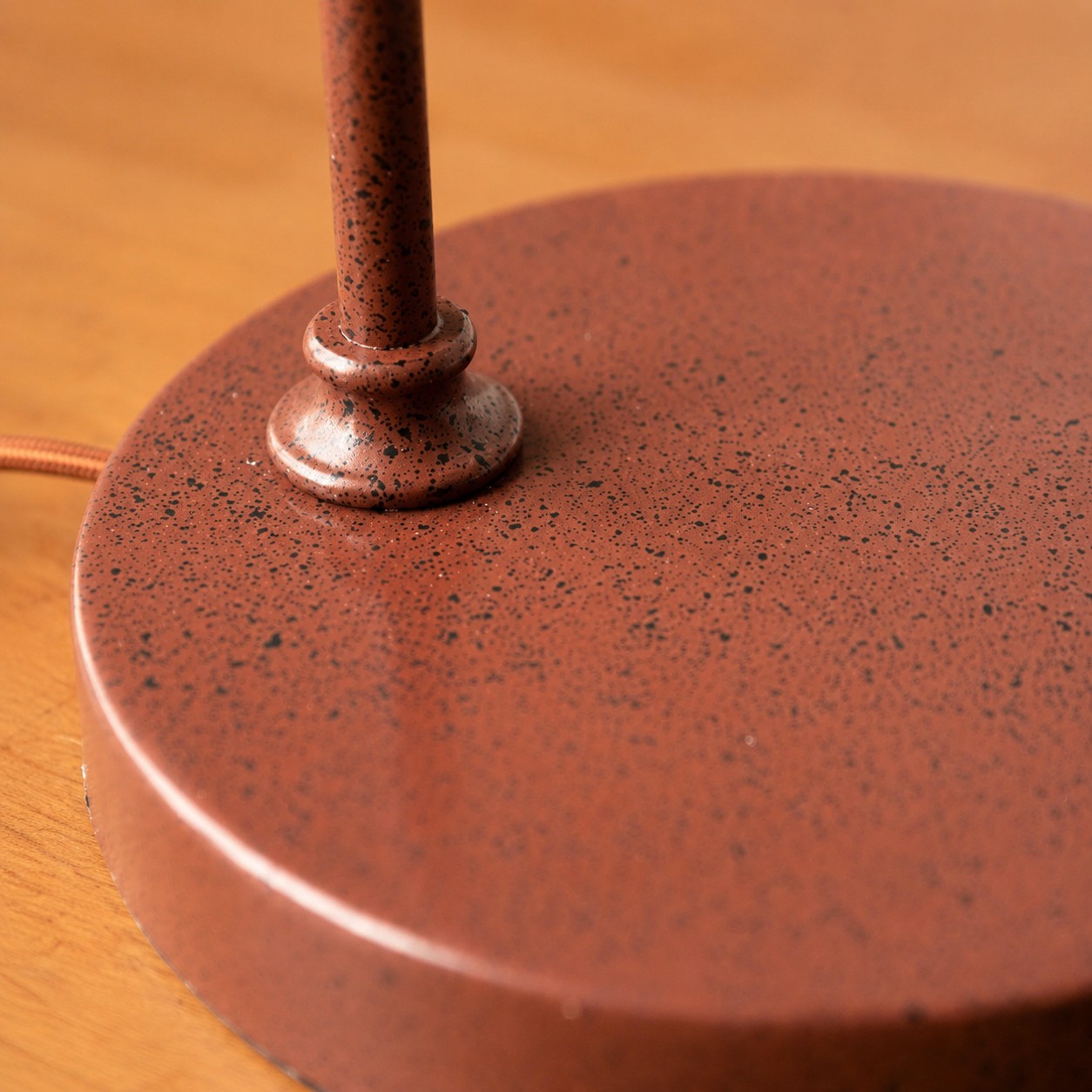 Close-up of the round metal base