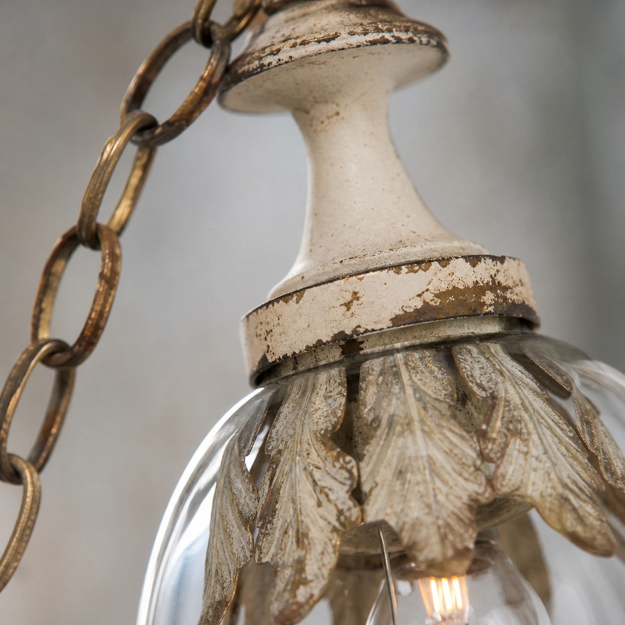 Close view of the glass surface and sculpted petal decoration