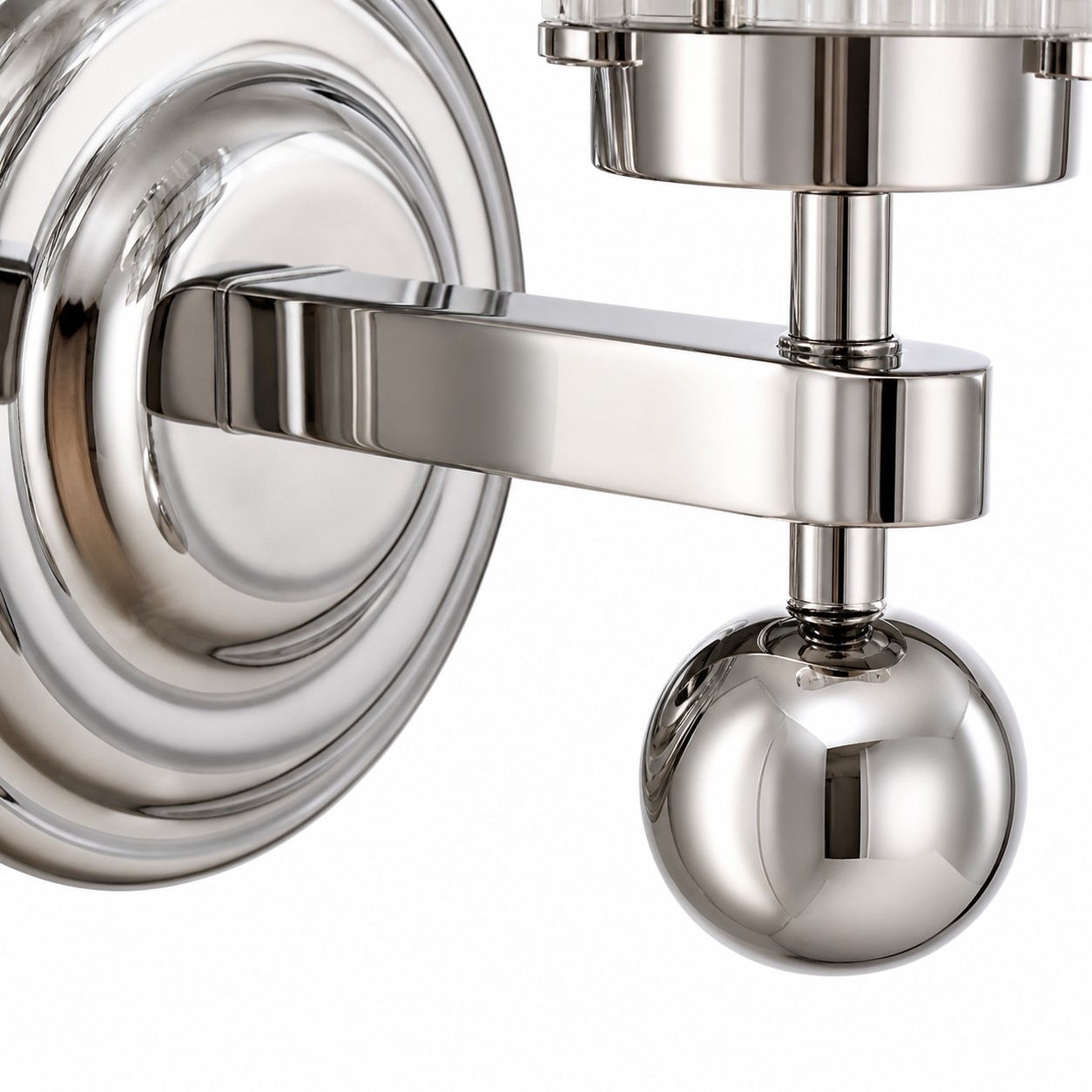 Polished wall arm and metal sphere detail