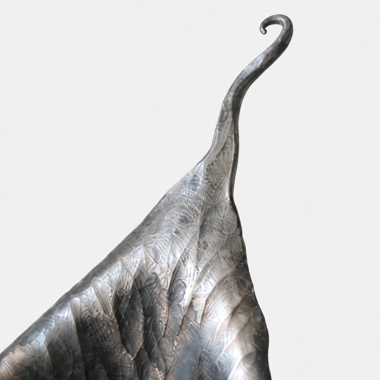 Close view of the forged iron calla lily petal curve