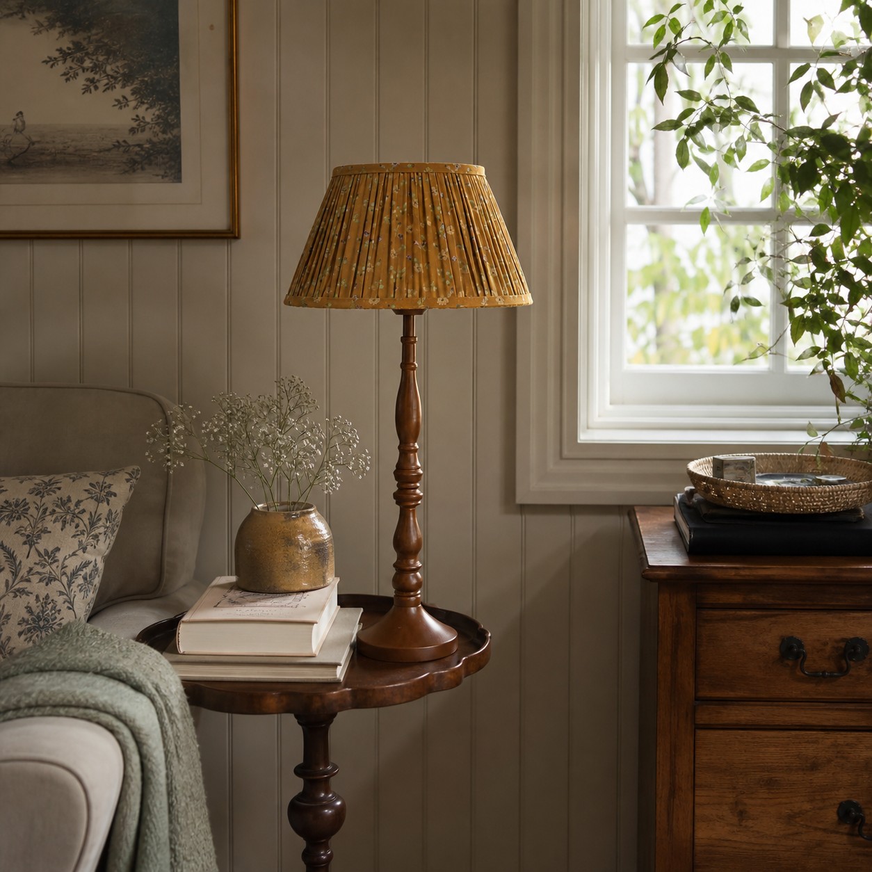 Floral pleated shade table lamp in a vintage living room setting
