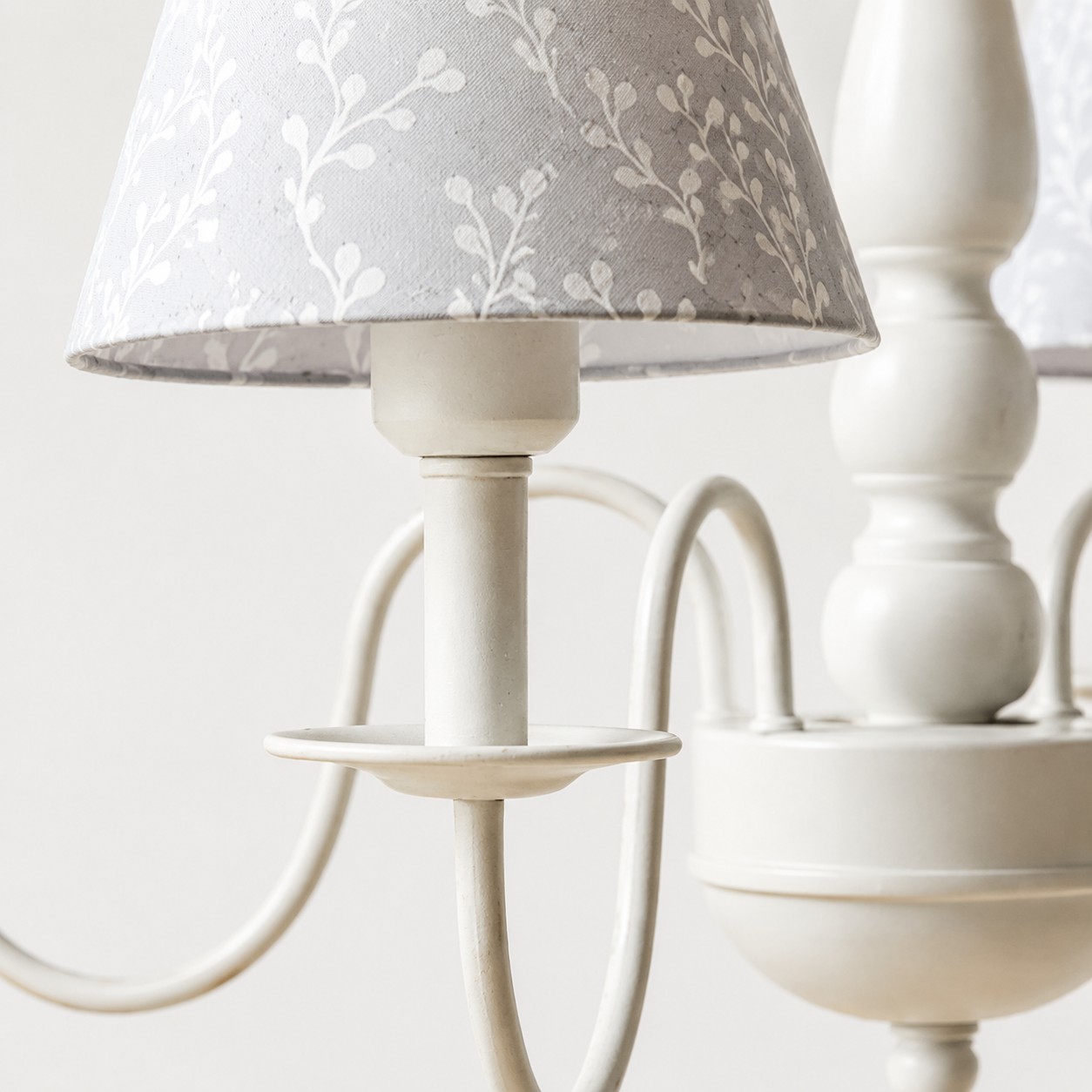 Fabric shade and candle-style holder detail