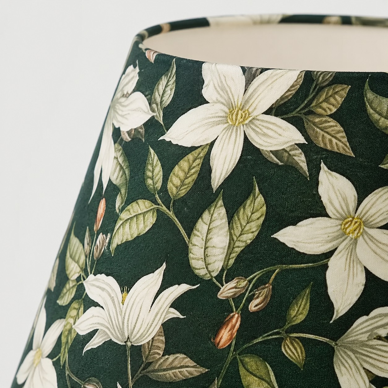 Close-up of glossy green ceramic table lamp body