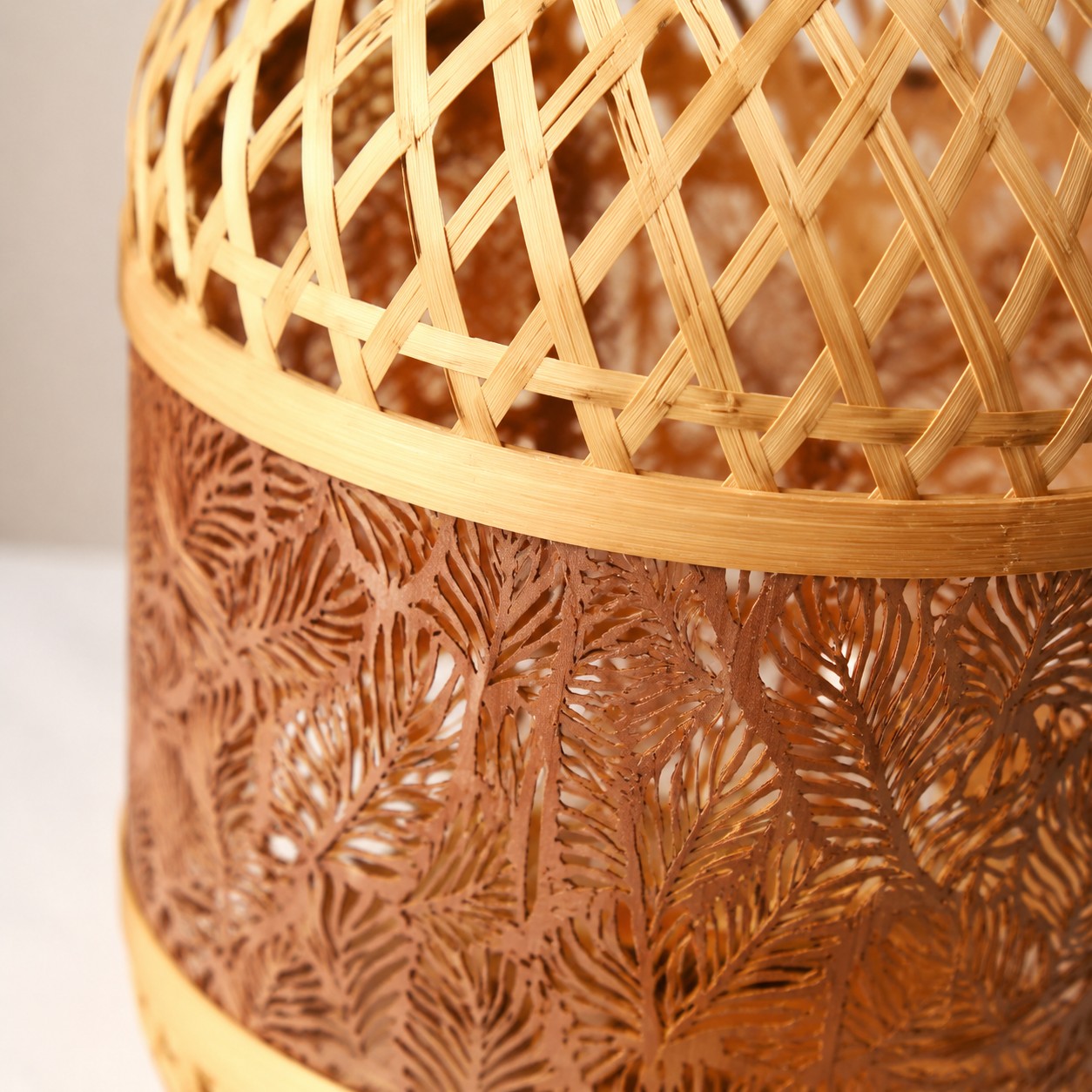 Close view of woven bamboo texture on the orange LED table lamp