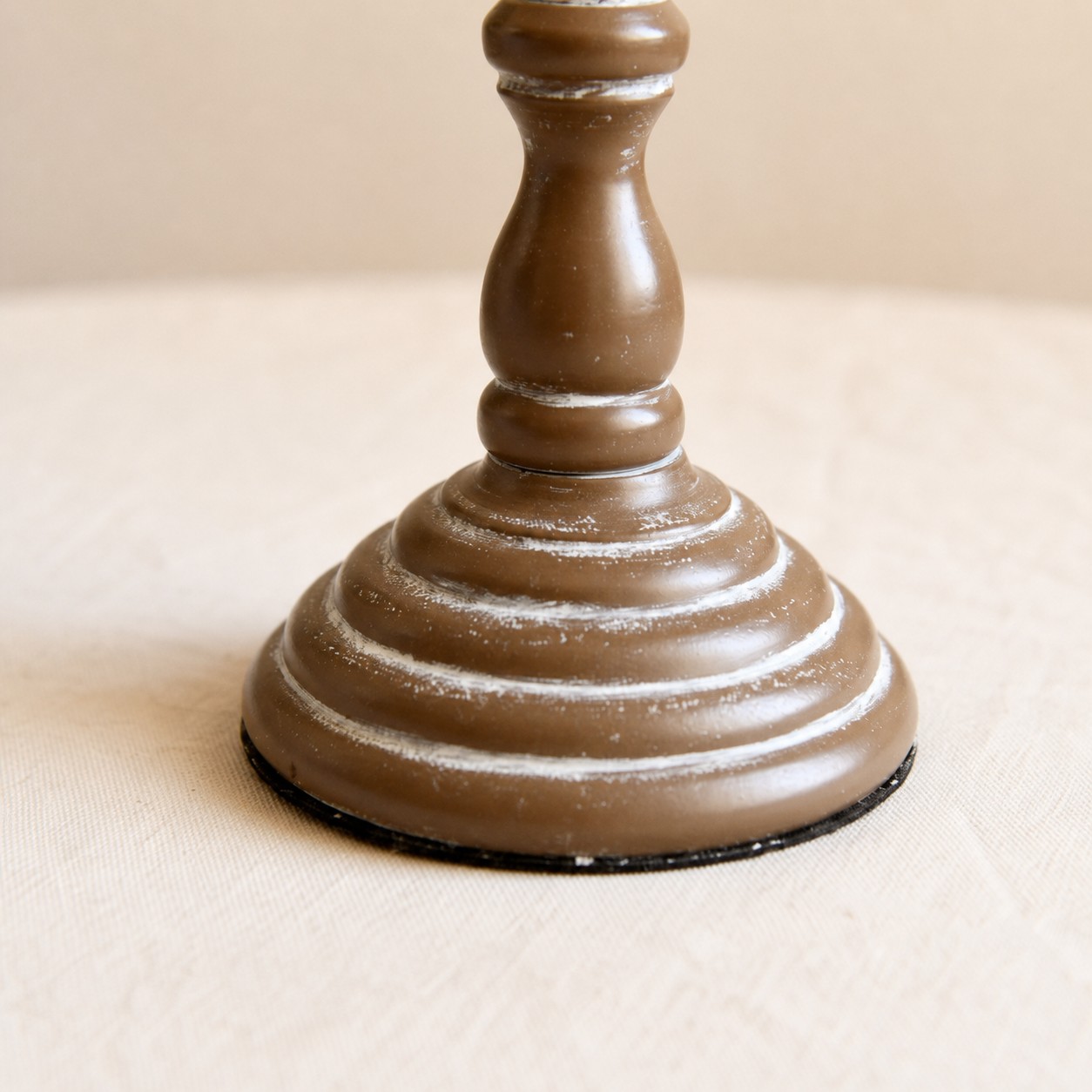 Distressed brown metal base detail