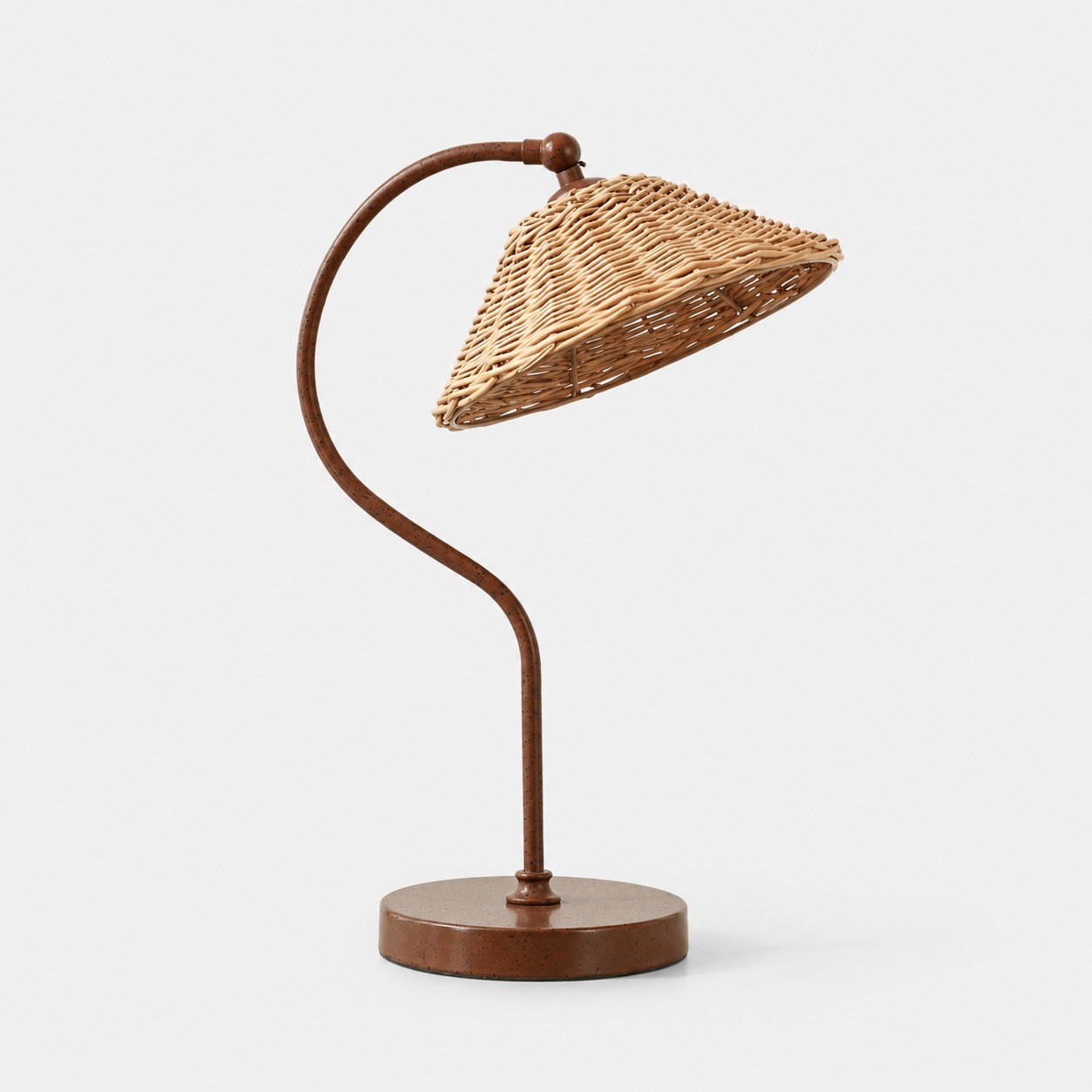 Natural rattan shade table lamp on a light gray background