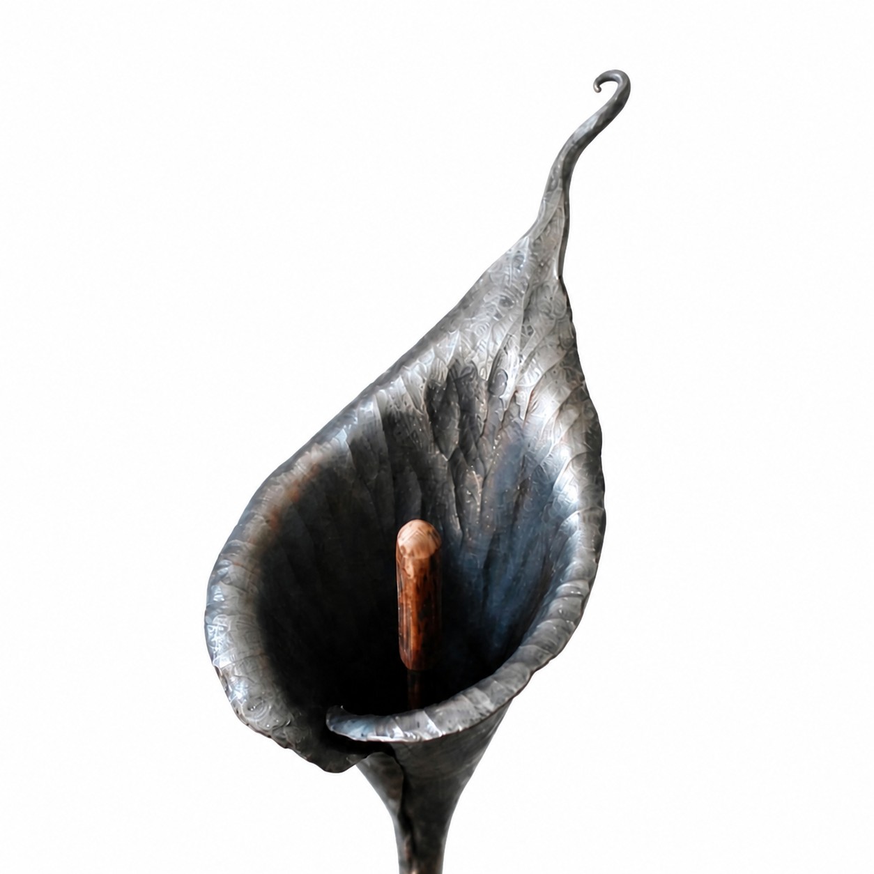 Close view of forged metal texture on the decorative stem