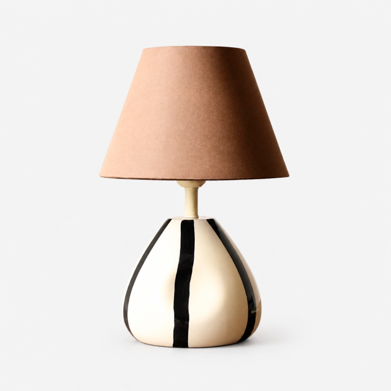 Sculptural striped ceramic table lamp with fabric shade