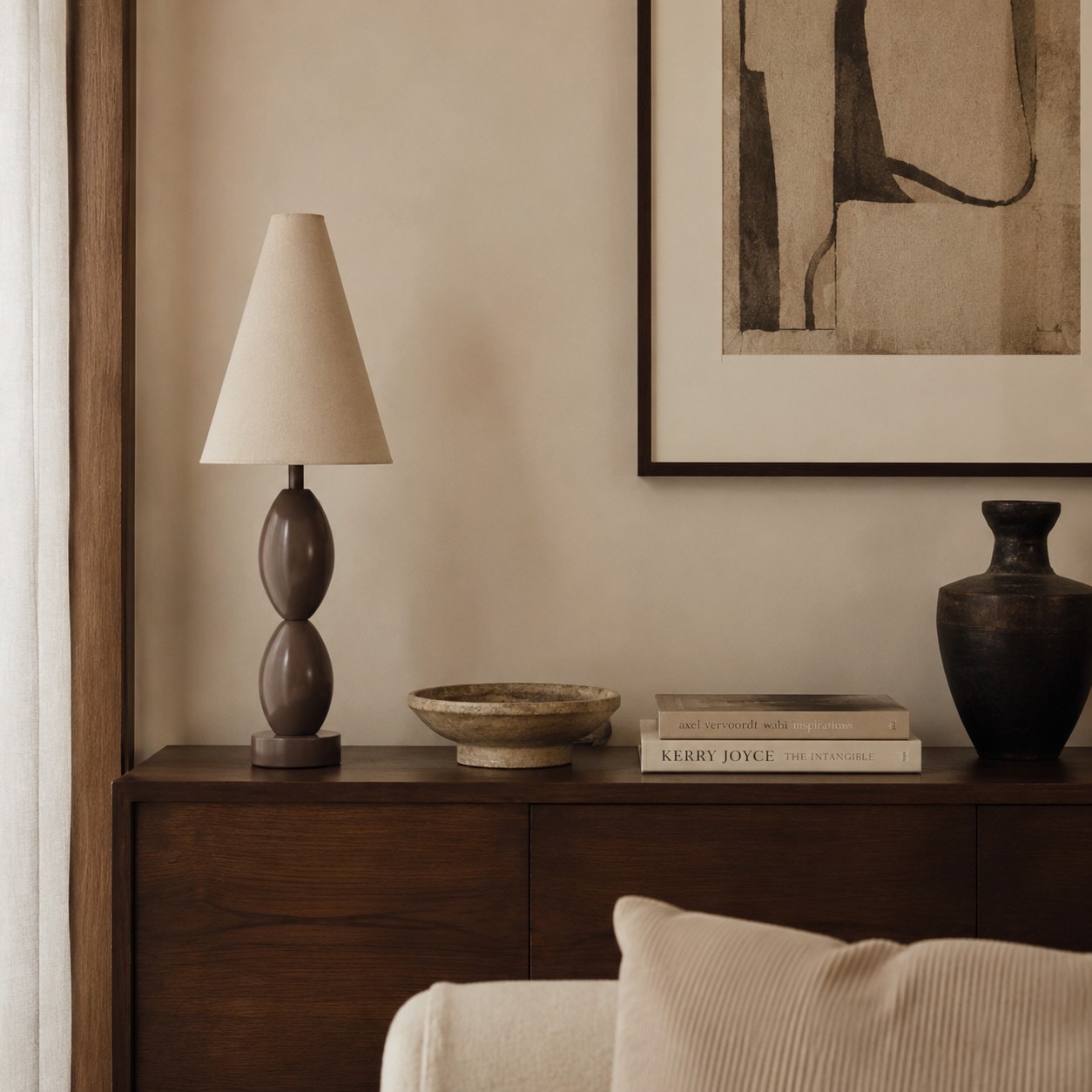 Sculptural table lamp styled on a bedroom console