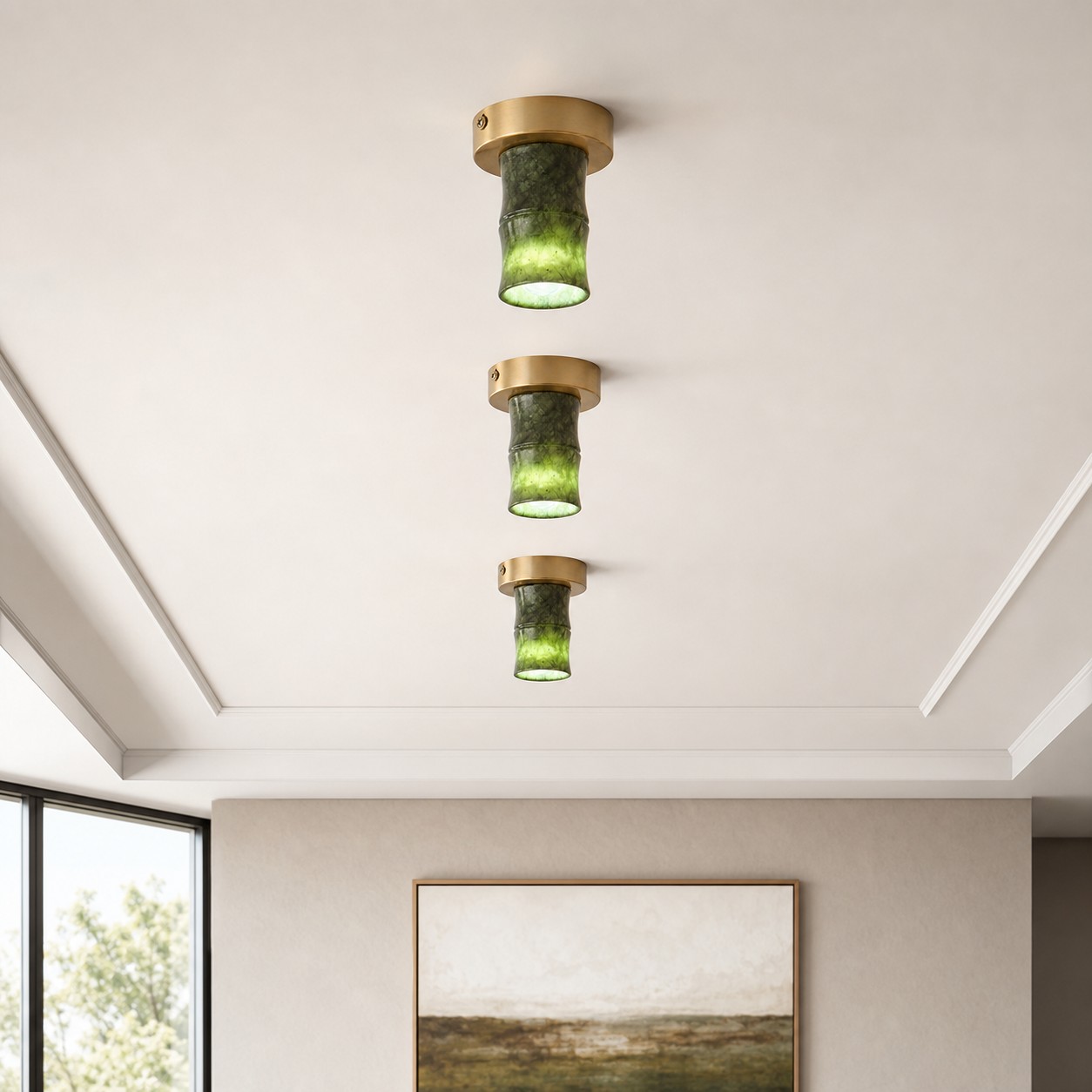 Tres lámparas de techo Jade Lamps dispuestas a lo largo de una habitación.